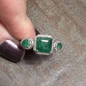 Sterling silver and rough cut emerald green stone ring. Size 8 3/4